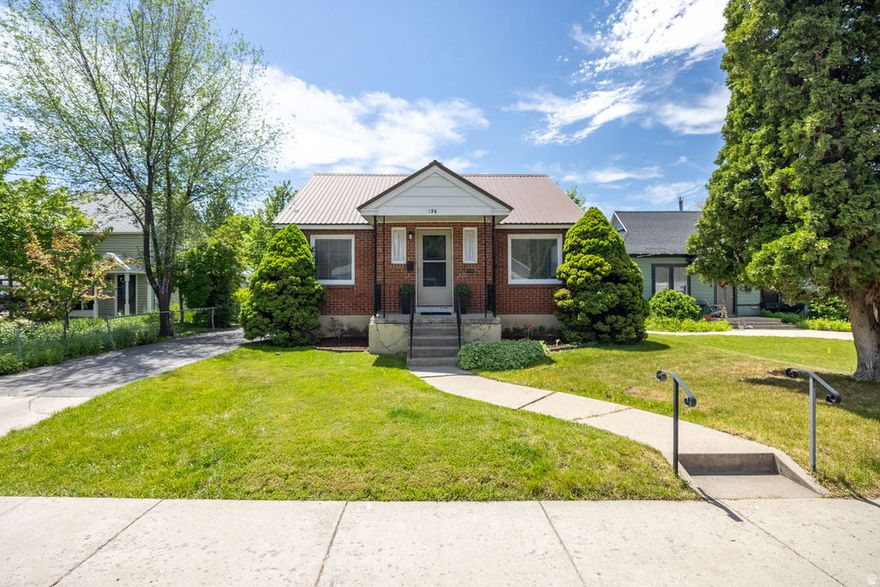 Charming all-brick bungalow with a remodeled mother-in-law apartment featuring a separate kitchens and separate laundries. Basement ADU just needs a fire egress window to be fully legal as per Logan City code. Covered carport, workshop/storage space, and a cute fenced yard with a cozy firepit. Located close to USU, downtown Logan, shopping, restaurants, parks, hiking trails, and everything Cache Valley has to offer. Great for investors, house hacking, or multi-generational living. Priced to sell!