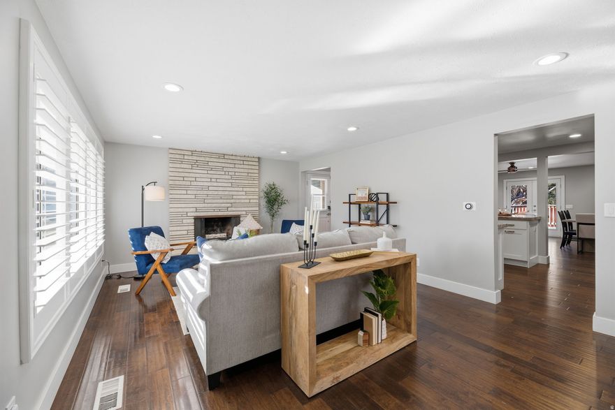 Priced below 700k!!!!!  Open House this Saturday 1/24 11-1. Nestled in the heart of Cottonwood Heights, this exquisite home boasts a recent complete remodel, offering a blend of modern sophistication and cozy comfort. Recessed lighting throughout, two fireplaces have been thoughtfully prepared for gas inserts, elegant shutters adorn the front window, and engineered hardwood floors flow seamlessly. The main bathroom is a sanctuary of relaxation, featuring an extra-long and deep tub. The functionality of this home is truly exceptional. The basement offers versatility, whether you need additional storage space or desire to create an extra living area. The backyard is an entertainer's paradise. A spacious deck extends from the house, creating the perfect spot for gatherings, barbecues, or simply enjoying your morning coffee. A generous cement pad and a playground included, making it an ideal space for family fun. Location is key, and this home has it all. Situated in the coveted Cottonwood Heights neighborhood, you'll have easy access to Big Cottonwood Canyon, a haven for outdoor enthusiasts with hiking, biking, and skiing opportunities galore. In addition, the Fort Union district is nearby, boasting shopping destinations like Whole Foods, Trader Joe's, Target, and a wide range of restaurants to satisfy every craving. Buyer responsible to verify all MLS listing data. Square footage figures are provided as a courtesy estimate. Buyer is advised to obtain an independent measurements.