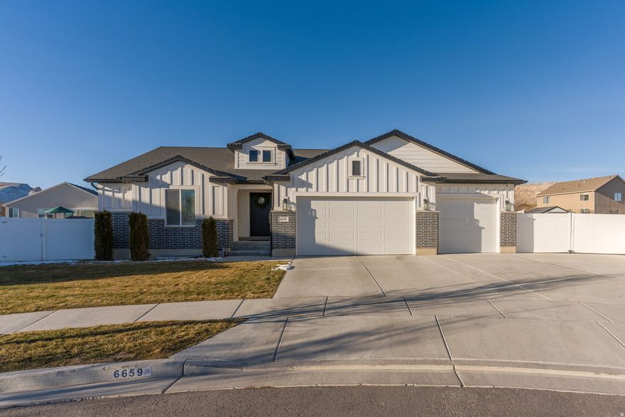 Welcome to this stunning, better-than-new 2020 Herriman home on a rare .34-acre east-facing lot! Vaulted ceilings and stylish finishes fill the home with light. Enjoy sunset views from the extended deck, a finished basement, and an entertainer's dream yard with pergolas, a basketball hoop, and an in-ground trampoline. Ample RV parking, great storage, NO HOA- move right in!   Square footage figures are provided as a courtesy estimate only.  Buyer is advised to obtain an independent measurement.