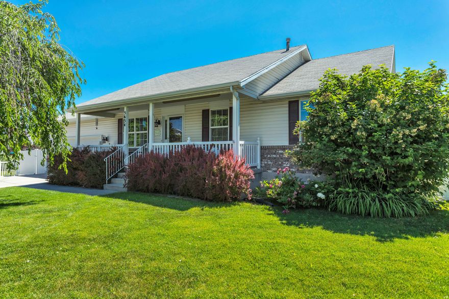 You are sure to fall in love with this immaculately maintained Stansbury Park home nestled on a quaint cul-de-sac. Enjoy the  beautiful mature landscaping while sipping lemonade on the large covered front porch. Large RV parking will accommodate your extra vehicles. The roof is brand new, installed in October 2025. The interior has been nicely updated with  newer flooring, fireplace rock surround, paint, and refinished kitchen. The backyard is fully fenced and feels very private. A  12'x16' custom shed with electricity and finished to drywall - heating and cooling (mini split) as well as another large garden shed are included. Square footage  figures are provided as a courtesy estimate only and were obtained from County Records. Buyer is advised to obtain an  independent measurement.