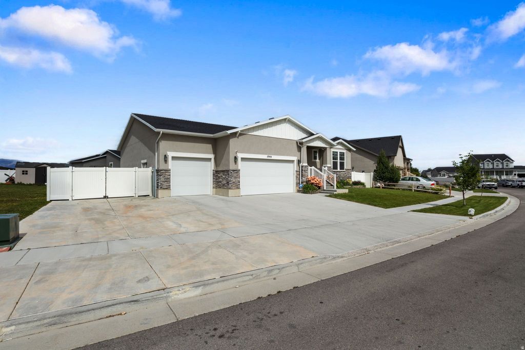 Photo of 5945 N TIPPECANOE LN, Stansbury Park, UT 84074 (MLS # 2159930)