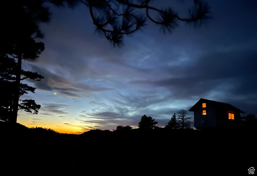 Welcome to a rare opportunity to own your own slice of paradise in the heart of Utah's dramatic canyon country. This remarkable 20-acre property at Deer Springs Ranch offers everything you seek in a private getaway: untamed natural beauty, unobstructed views of the famous pink cliffs, and a cozy 10x16 cabin perfect for weekend escapes or as a base for your wildest outdoor adventures. If you are searching for remote charm, privacy, and a direct connection to the land, this is the sanctuary you've been dreaming of.