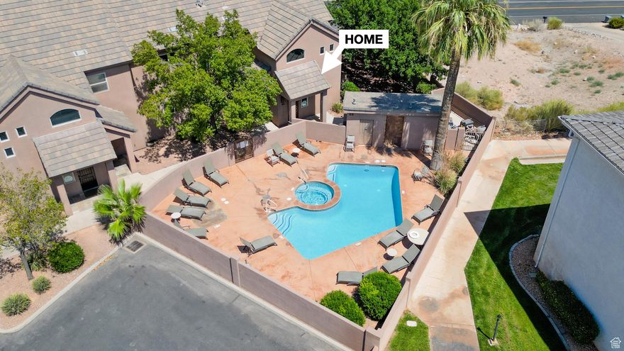 Spacious 5-Bedroom, 5 bathroom St. George Condominium  Zoned for Nightly Rental- Fully furnished. This beautifully appointed 5-bedroom, 5-bathroom condominium offers the perfect combination of comfort, privacy, and opportunity. Each bedroom has access to its own bathroom, making it ideal for multiple couples, families, or groups to stay together while still enjoying personal space. The master suite is especially spacious, featuring a large, connected master bathroom. Located on the second floor, this home offers sweeping views of St. George and the striking red cliffs of Snow Canyon. A private deck provides the perfect place for grilling, gathering, or simply soaking in the scenery. Inside, you'll find two generous living spaces: an upstairs area ideal for youth or guests, and a large main family room designed for entertaining and relaxing. This property is being sold FULLY FURNISHED with beautiful furniture, a large-screen TV, a new washer and dryer, and more-making it truly move-in ready. Community amenities include a pool and hot tub for year-round enjoyment. The location is unbeatable, just blocks from the Bear Claw Poppy Trail and Gap Trailhead, with direct access to the popular Red Bluff trail network that connects to the Bloomington trail system. Whether you love hiking, climbing, or mountain biking, adventure is right outside your door. One of the greatest advantages of this condominium is its rare zoning for nightly rentals, offering an excellent opportunity for rental income in addition to being a beautiful vacation getaway or permanent residence