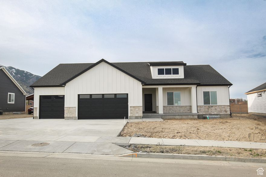 Back on the market!  Don't miss out on this amazing home! New home with a 2 bedroom 1 bathroom accessory dwelling unit in the basement next to Utah State University.  Basement apartment has its own entrance and designated parking.  The Madison XL plan is an open living concept plan with huge great room w/ tons of storage in kitchen.  Excellent central location to all the features of Logan and Cache Valley.  Just a few blocks off USU campus.  Endless possibilities with the second living space. There's a 4 car garage plus additional ou door parking.  Hurry and call for your opportunity to own this unique home.