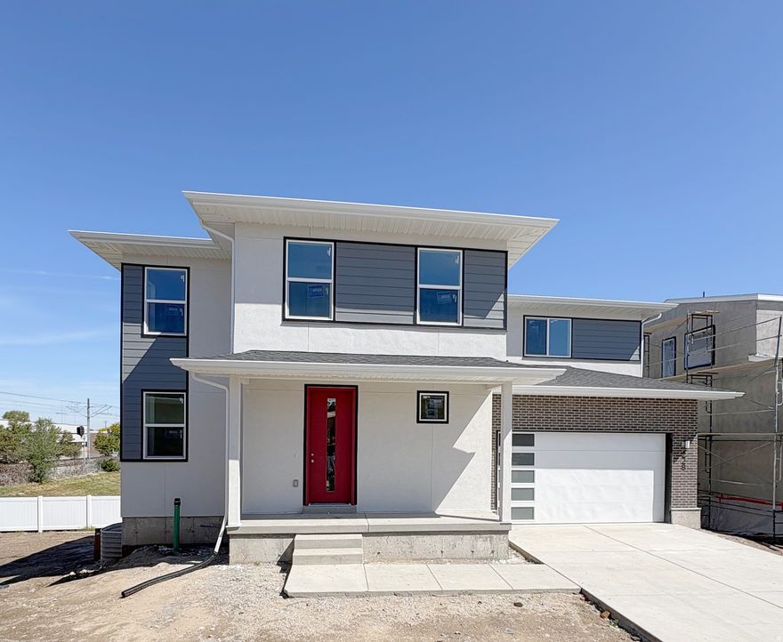 INCREDIBLE SAVINGS, up to $30,000 any way!!  Final opportunity. One of the last few remaining homes in Waterstone-an intimate community of just 15 homes in the heart of Murray. Enjoy walkable access to public transit, Fashion Place Mall, Topgolf, plus dining and shopping, with quick freeway access to downtown, the airport, and the Cottonwood Canyons.  Imagine starting your mornings on the front porch before heading out for a walkable lifestyle, then coming home to light-filled living spaces where the kitchen naturally becomes the heart of it all-perfect for gathering, hosting, or simply unwinding.  Upstairs offers flexible space for movie nights, work, or play, along with comfortable bedrooms and a spacious primary suite designed for relaxing at the end of the day.  Construction has begun with professionally selected designer finishes. The home also features a walkout basement with the option to finish as a full ADU for added space or rental potential.  Built with all-electric systems, advanced insulation, and Localscapes landscaping for efficient, low-maintenance living, plus a builder warranty for peace of mind.  Estimated completion: April/May 2026.