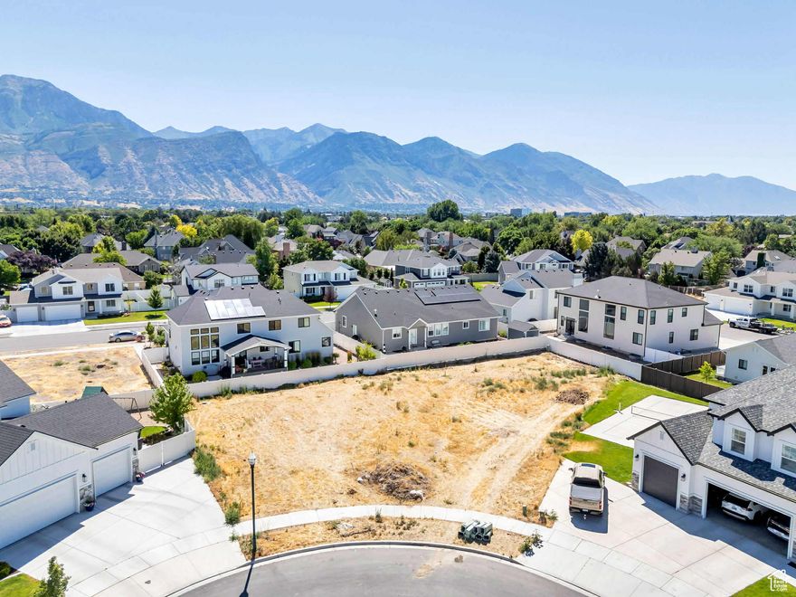 You won't find many ready-to-build lots like this left in Orem! This fully developed property is ready for you to build your custom home in a cul-de-sac, surrounded by beautiful homes in a newer development.  THE FARM has seen 62 custom homes built in the last six years, offering a well-planned community and giving you a clear view of quality homes and neighbors already established around you.  Your future home will be situated to have a gorgeous view of the Wasatch Mountains tucked back in a quiet neighborhood but also just minutes from Utah Valley University, the freeway, University Mall, Target and restaurants. Location really is everything. Curb, gutter and sidewalk are installed and utilities stubbed for connection.  Don't miss out on making this land yours!