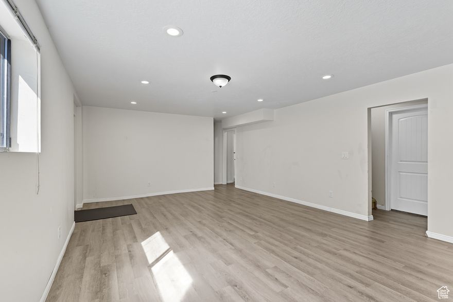 Spacious 3-bedroom unit available in a quiet Sugar House neighborhood, just minutes from the U of U and Westminster. This private downstairs unit features a separate entrance, brand new LVP flooring, a huge living room, full kitchen, bathroom, in-unit laundry, and large bedroom closets. Enjoy two off-street parking spots and included internet.  Rent is $2,200/month plus shared utilities. 12-month lease minimum with one month's rent as deposit. No smoking or pets.  Available Now.  Serious inquiries only message to schedule a showing.  Utility situation is negotiable.