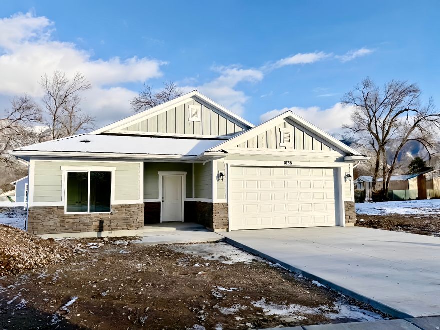 You won't find another single-family home of this size, with these high-end finishes and no HOA, at this price in Weber County. This charming new ranch/rambler/patio home offers an open floor plan with 3 bedrooms and 2 full bathrooms all on one level, plus a 2-car garage. Features include 2-tone paint, high-end cabinetry, quartz countertops, LVP flooring, plush carpet, abundant recessed lighting, hardy plank, and a stone front exterior. Located on a quiet street of just 11 homes with a cul-de-sac, it's one block from 9th Street Park and only 20 minutes from Hill Air Force Base. Home is currently under construction and scheduled for completion in January 2026. $2,500 preferred lender credit available!