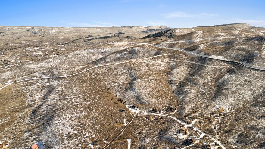 4.29 acres in gated Timber Lakes offering privacy, views, and a true mountain lifestyle. This west-facing, gently sloped parcel features multiple potential building sites designed to capture sweeping mountain and valley views, sunsets, and star-filled skies. Surrounded by mature aspens and alpine terrain, the setting provides a rare sense of seclusion while still offering year-round access and recreation. Timber Lakes is known for its private trails, stocked lakes, and direct access to the Uinta National Forest. Ideally located just minutes from Heber City and within easy reach of Park City, this property is well-suited for a luxury cabin or full-time mountain retreat. Lot lines shown are approximate; buyer to verify all information.