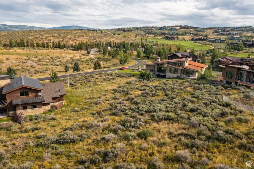 Located in the coveted Westview neighborhood in exclusive Promontory, this exceptional homesite has unobstructed panoramic views of the Unita mountains and Park City, Canyons and Deer Valley ski resorts. The .56-acre homesite is conveniently located near the main gate just minutes away from downtown Park City. The gently sloping lot includes architecturally designed plans for a mountain modern home with 4 ensuite bedrooms, a home office and a 3-car garage. Plans have been approved by the Promontory Architectural Committee and are ready for building permits. Homesite is adjacent to golf course and hiking trails. Lowest priced homesite in prime location on front side of Promontory. Capture this chance to own this ideal homesite and live the Promontory lifestyle.