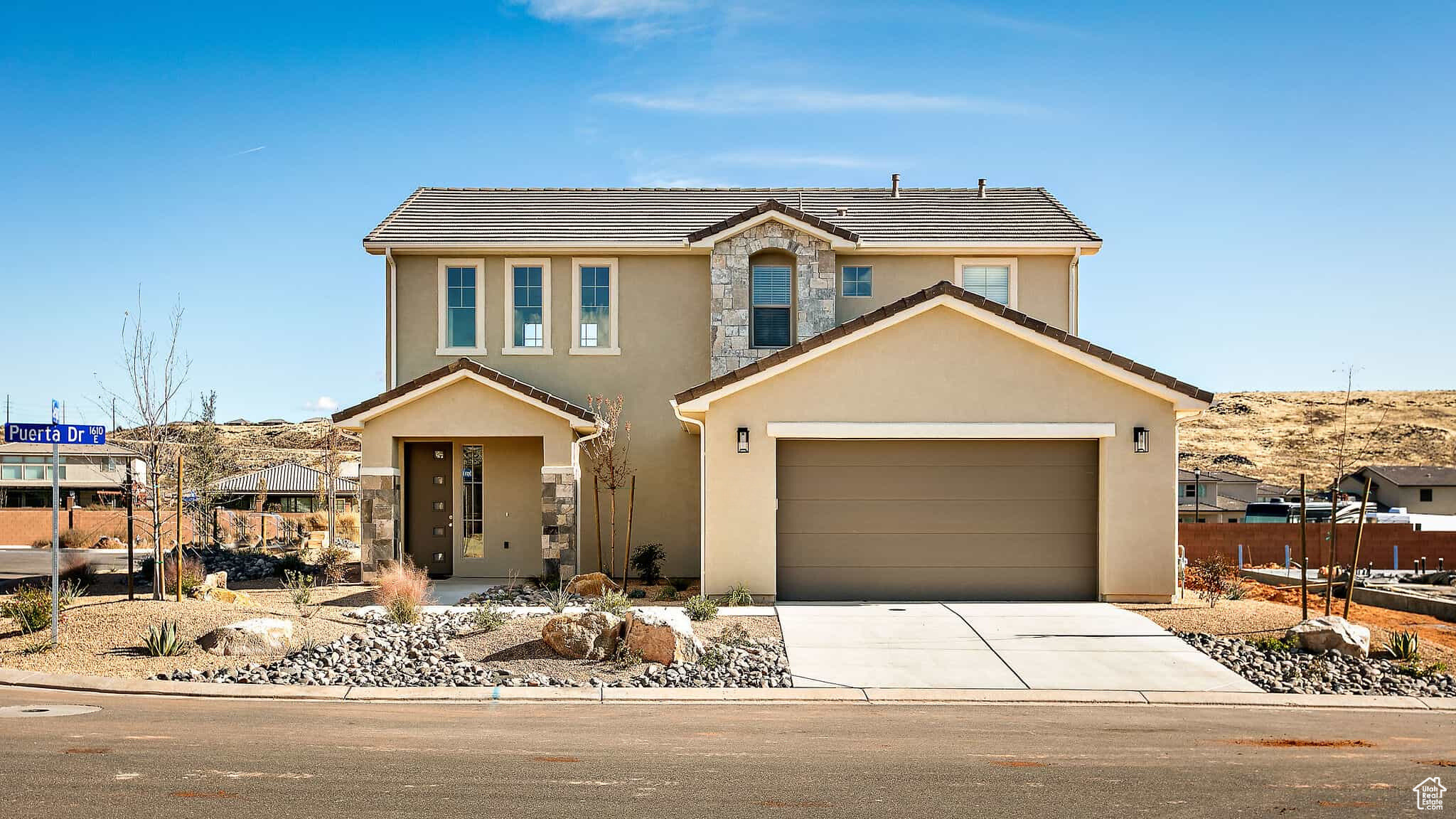 Turn Key Nightly Rental Professionally Designed. Home Sold Fully Furnished. Prime Investment Opportunity. This Home has High End Finishes Through out. You Choose Nightly Rental or Your Fun Filled Southern Utah Retreat. Ladera Community Pool & Spa is only a few houses away. Close by is Siennna Hills Park. Ladera provides parking for Guests, Boats & Trailers. On the Main Floor is the Master Suite which is Large Open and a Beautiful Retreat has a King Size Bed & A Luxury Ensuite. At the top of the stairs is a bonus space which can also be utilized for sleeping. Top Floor has 3 bedrooms . 1 bedroom has a Queen Bed & 2 Bedrooms have bunk beds. The yard is professionally Landscaped with native plants. This home sits on a premium corner lot that includes a covered patio & grill. The front porch is set back and roomy. Easy access to so many Parks Zions, Snow Canyon, Sand Hollow, Jelly stone, Airport, Golf, Dining Theater, Restaurants. So many adventures very close by.