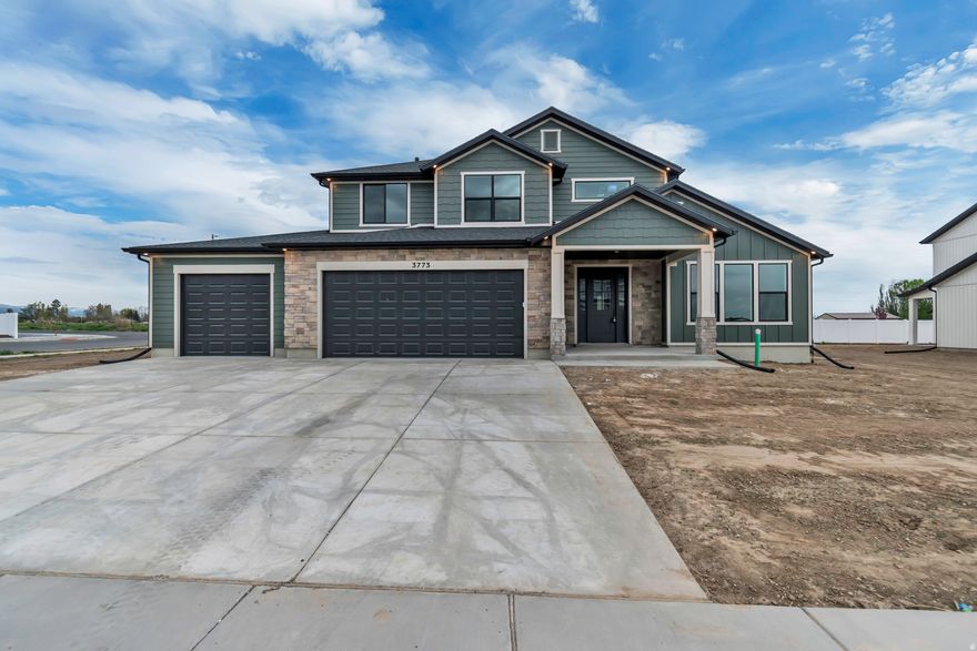 This 4-bedroom, 2.5-bath home offers 2,923 sq ft of well-planned living space, featuring a spacious main-level primary suite with oversized amenities and a convenient stackable washer/dryer in the closet. The kitchen is built to impress with a massive walk-in pantry, complete with room for an additional fridge or freezer and plenty of countertop space. Enjoy a 3-car garage, covered patio for outdoor living, and an upstairs family room perfect for relaxing or entertaining. A smart, livable layout in a great community walking distance from schools, parks, and churches. There is time for customization to make this home truly yours. We will even give $10,000 towards closing costs or design upgrades when using a preferred lender. Come visit and learn more! Photos are of a finished version of this house. finishes will vary. Home will be finished by the end of August.
