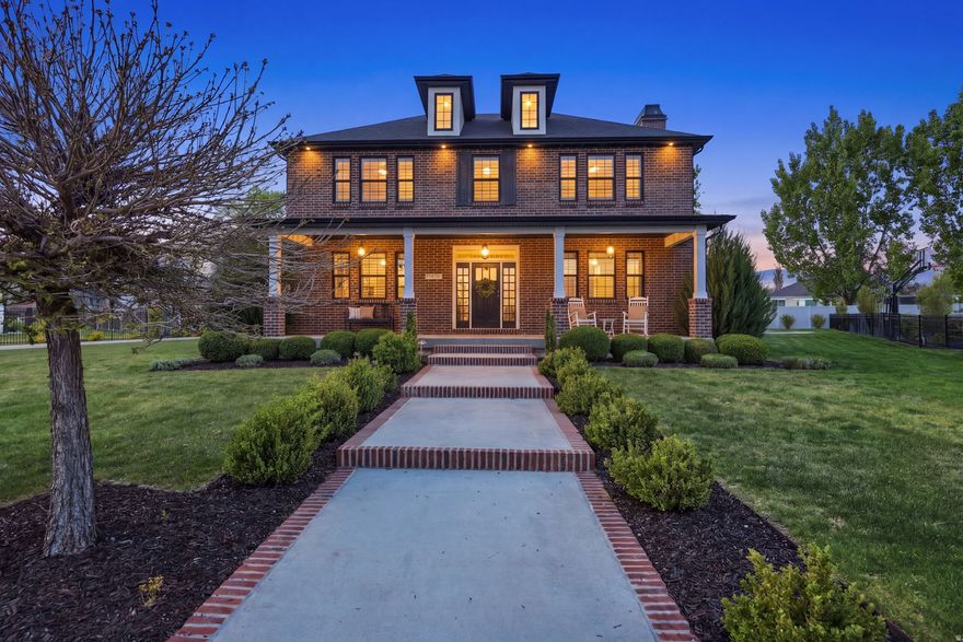 Tucked away in a quiet cul-de-sac in highly sought-after Kaysville, this stunning custom-built home blends refined design with everyday functionality. The open-concept main level features tall custom cabinetry, a striking cement-top island, and a spacious walk-in pantry-perfect for both entertaining and daily living. Expansive slider doors fill the home with natural light and create seamless indoor-outdoor flow. The main-level primary suite offers a private retreat with dual walk-in closets and a spa-inspired bath featuring a steam shower and dual vanities. A dedicated office and the option for one-level living add flexibility. The fully finished basement is designed for entertaining with a large family room, kitchenette, and abundant storage throughout. It also includes space for a future bedroom and bathroom-ideal for a guest suite or expanded living. A standout feature is the fully reinforced concrete safe room with a vault-style door, offering exceptional security and versatility. Enjoy a private backyard oasis complete with a built-in hot tub, covered patio with fireplace and grill, and a gazebo with lighting-perfect for year-round gatherings. Additional highlights include 4 bedrooms, 3.5 bathrooms, a custom laundry with built-in lockers, and a 3-car garage. Conveniently located near shopping, dining, and commuter routes including Highway 177 and I-15, just 30 minutes from Salt Lake City.