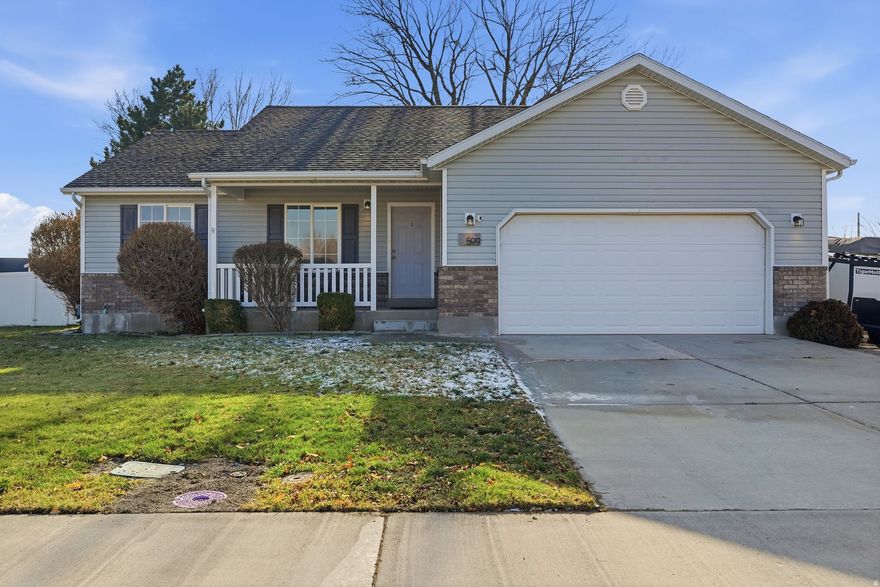 Open House Saturday January 17th, 11am - 1pm, don't miss seeing this beautifully updated Lehi gem!  With new paint,  carpet, and sleek LVP flooring throughout, this home is fresh and impeccably cared for. Step inside to vaulted ceilings and abundant natural light that make the space feel open and bright. Spacious primary suite with a private en suite bath and two additional bedrooms plus a second full bath.  The kitchen features ample counter space and updated appliances which are included.  You will love the covered front porch, huge fully fenced backyard with mature shade trees, fire pit, and large fenced in dog run. The yard is perfect for summer evenings, pets, and play. Owners of extra vehicles will appreciate the extra parking and RV parking (currently being used as dog run), plus there's plenty of room for all your toys in the spacious garage which features hanging storage shelves. Enjoy incredible convenience with a premium downtown Lehi location, close to shopping, dining, great schools and commuter routes. A huge neighborhood park just down the street means playtime and outdoor fun are always nearby.  This home truly shines!
