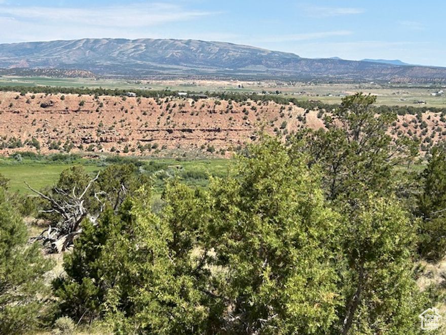 10 private acres, above the Currant Creek. Property is about 1/3 of the way up Currant Creek Mountain. The fire a few years ago stopped at the property line, the property is not burnt. Tall pinion-pines and junipers. Great view of the river valley below. There is a power pole on the southeast corner of the property, and good water wells can be drilled in the area.
