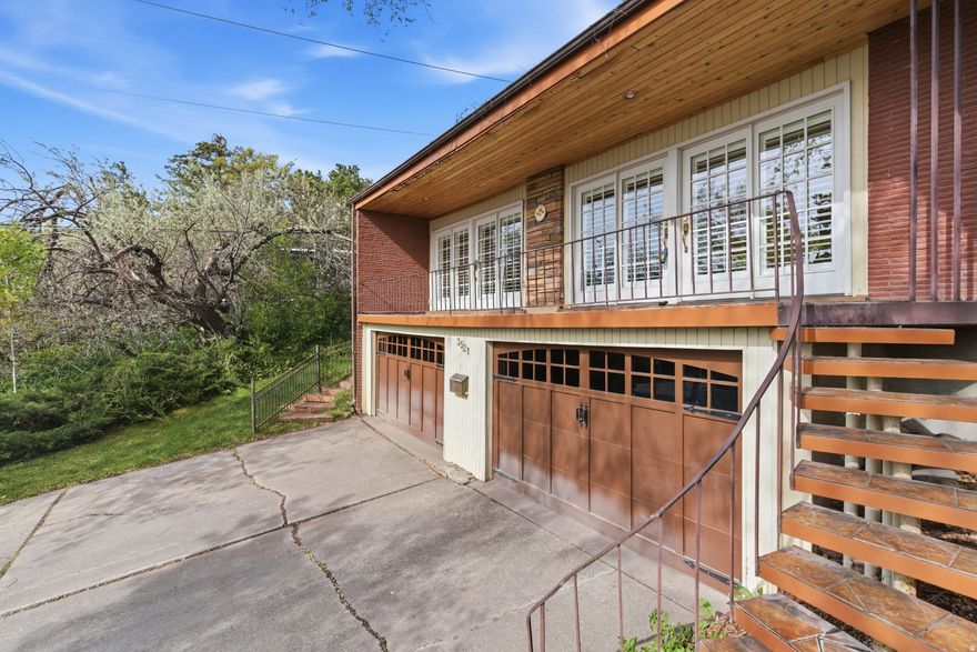** MULTIPLE OFFERS RECEIVED **  Rarely available home under $1M in the Mt. Olympus area above Wasatch Boulevard. Located on the top street in the Olympus Cove North neighborhood with breathtaking sunset and city lights views from its 150 sq ft covered front deck, this old mid-century marvel is ready for someone to make it shine, again. Hardwood floors, large windows, and abundant natural light create a warm, inviting interior and connect it with nature outside. Features include a spacious living room with fireplace, formal dining area, kitchen with breakfast bar, and a primary suite with ensuite bath. The backyard is a private retreat with mature trees, open meadow spaces, and a flagstone walkway. A gate provides direct access to Grandeur Peak and Millcreek Canyon trails. Enjoy the perfect balance of nature and convenience, with easy access to Sugar House, downtown Salt Lake City, Park City, and world-class recreation in Big Cottonwood Canyon. Top-rated schools and proximity to the University of Utah keep homes in this area at high demand. ** Open Houses on April 28th, 29th, 30th from 5 to 7pm, and May 2nd from 11am to 2pm. ** Oversized Built-in Garage - 570 sq. ft. ** Wood back deck - 180 sq. ft. ** Buyer/Agent verify all info. ** Sq. Footage per county records. ** 48-hour response time due to the seller living in a different time zone.
