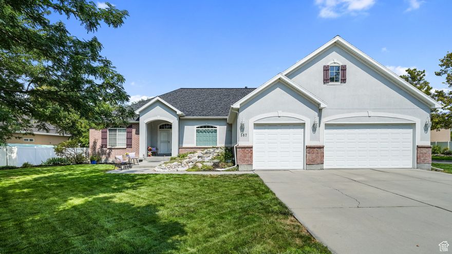 *Showings begin at our OPEN HOUSE Friday, October 10th from 6-8pm and Saturday, October 11th from 10am-1pm* Location! Location! Location! AND updated! Beautiful Draper home with main level living & basement apartment with full kitchen and separate entrance. KITCHEN: is a chef's dream, double ovens, gas cooktop, ALL kitchen appliances stay, breakfast bar that seats 5. MAIN LEVEL: private primary suite with fireplace & access to back deck, gorgeous flooring, sunny, flex space for piano or formal dining, main level laundry. BASEMENT: separate entrance, great room feel, full kitchen with ALL appliances staying, built-in 125 gallon aquarium, projector with surround sound, two additional bedrooms and a full bath, laundry room with washer & dryer for your tenant or extended family's use, night lights, storage room, and cold storage. GARAGE: 3 car, with storage above and some shelves. YARD: north facing back deck allows for a great BBQ spot in the summertime, patio area with pergola, brick pizza oven, mature foliage  and fruit trees that offer privacy and shade, plumbed for gas and water for adding a custom outdoor kitchen. NEIGHBORHOOD: walk to elementary and high school, skate park, trails, library, senior center, shopping all this plus I-15 access minutes from home. MECHANICS: Roof 2023, HVAC 2019, Water Heater 2018. *Buyer to verify square footage*