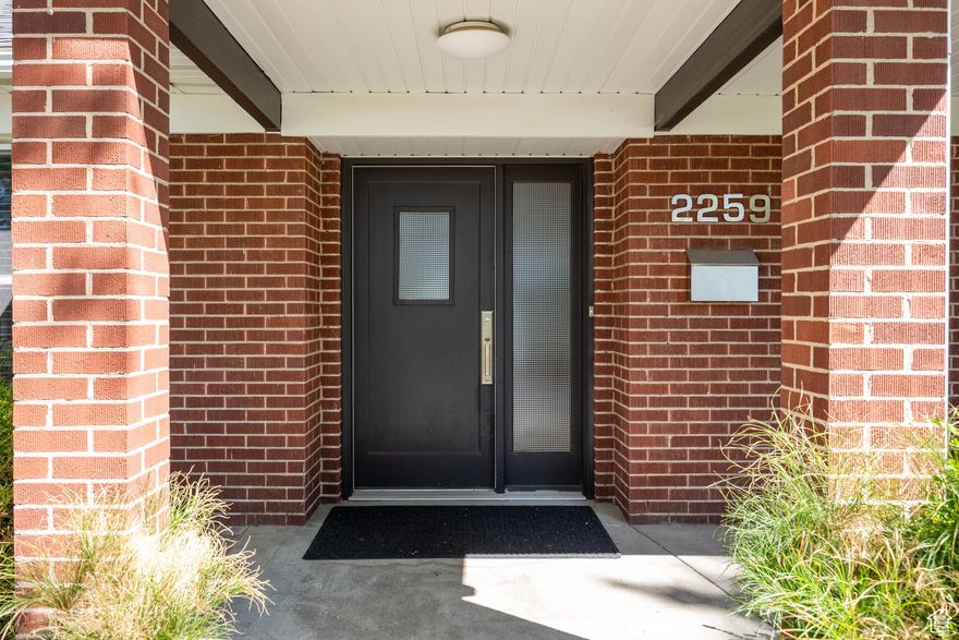 Welcome to 2259 Hubbard Avenue, and to one of the most sought after neighborhoods in the valley. Quiet and peaceful, yet mere blocks to the University of Utah, U of U Hospital, Huntsman Cancer Hospital, Research Park and the renowned entertainment triangle of Hogle Zoo, This is the Place and Red Butte Gardens, there isn't a more perfectly situated location anywhere. The home itself is lovely and serene with an open, flowing floor plan, updated kitchen and baths, spacious main floor en suite Primary Bedroom, formal dining overlooking the secluded backyard and a gracious welcoming formal living room. Downstairs, there is an inviting, spacious family room, guest bedroom and office, enviable laundry room with acres of counter space, and additional rooms for plenty of storage. The oversized, heated two car garage provides more space for cars, bikes, and toys of all kinds (children's AND grown up's). Hurry!