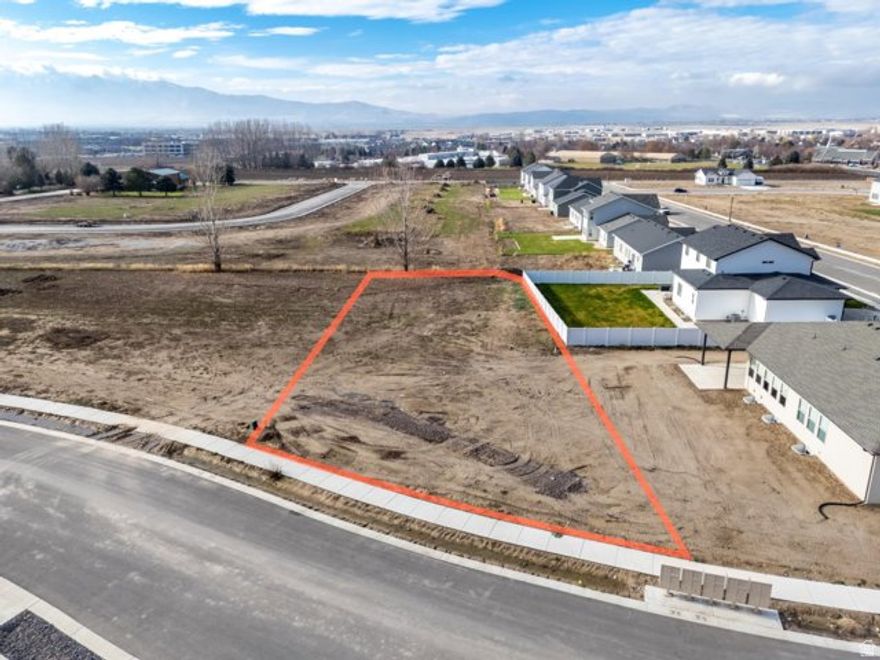 LOT 33 Smiling H Subdivision is an inviting community located in charming North Logan, Utah. This beautifully designed neighborhood offers a variety of amenities and features that cater to any lifestyle. Residents can enjoy the nearby recreational activities, including pickle ball courts, a splash pad for fun on warm days, and even an ice rink for winter sports enthusiasts. A public library and a police department nearby enhance the community's convenience and security. Families will appreciate the close proximity to schools, making it easy for children to access quality education. Additionally, every building lot is equipped with secondary water connections which is a big saver for the overall water bill. The availability of high-speed fiber internet provides residents with excellent connectivity for work and leisure. The fiber internet bill is part of the low monthly HOA fee of $65. Overall, Smiling H Subdivision offers a harmonious blend of nearby recreational opportunities and essential services, making it an ideal place to call home.