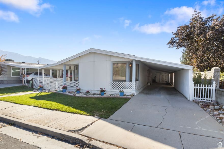 Charming Single-Level Manufactured Home on it's own land! You own your own land in this 55+ Alta View Estates Welcome to easy, low-maintenance living in the desirable 55+ community. LOW HOA fees! This spacious 1,850 sq ft home features 2 generously sized bedrooms, 2 bathrooms, and a large 2-car carport with extra storage space. Inside, you'll find a beautifully updated kitchen with abundant cabinetry and drawers for exceptional storage, a formal dining room with built-in china hutch, and an open-concept living area-perfect for hosting family and friends. Enjoy a peaceful, private backyard complete with lawn and vibrant garden space for flowers or vegetables that backs a park. Community perks abound, including a heated, covered in-ground pool, regular social events like bingo, book club, game nights, movies, pickleball, and more. HOA takes care of the yard work-so say goodbye to mowing! Pride of ownership shines throughout this well-maintained, self-managed community with low HOA fees.