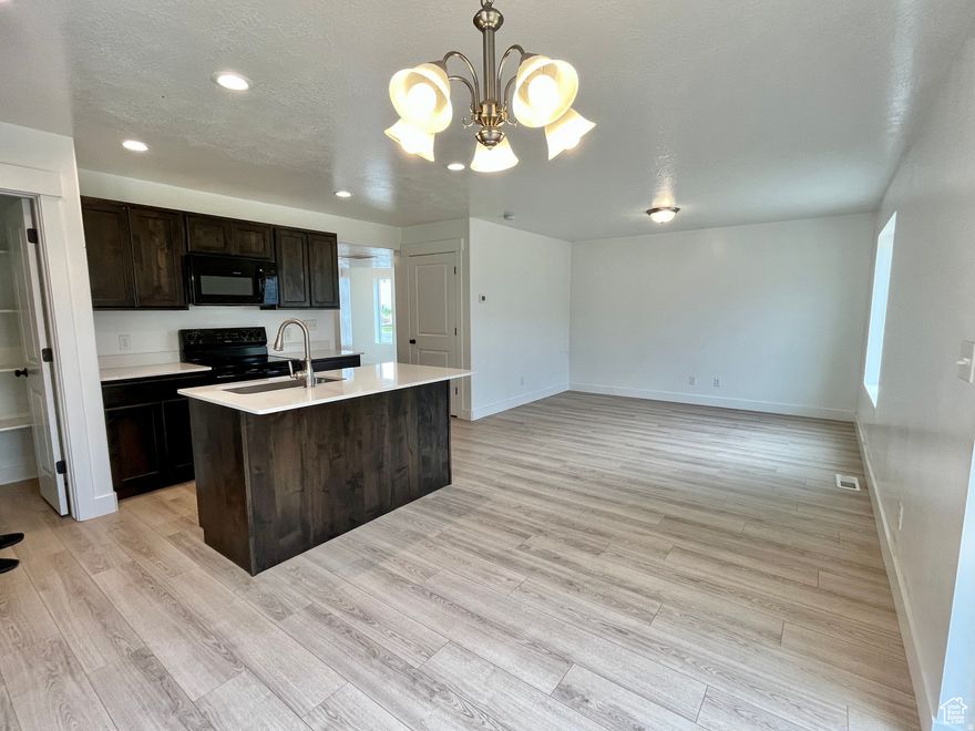 ******ASSUMABLE 4.65% VA LOAN****** Welcome to this adorable and modern two-story home, built in 2022, featuring four spacious bedrooms and 2.5 bathrooms. The open-concept main level offers a bright and inviting living space, anchored by a stylish kitchen with a large island-ideal for casual meals, entertaining, or prepping dinner with ease. The private primary suite is complete with an en-suite bathroom, your perfect retreat at the end of the day. An unfinished walkout basement offers endless possibilities for customization and expansion, whether you envision a home theater, a gym, additional living space or a potential ADU, this blank canvas allows you to bring your creative vision to life. You'll also enjoy the finished backyard, with gorgeous mountain views that make every sunset feel like a getaway. This home combines modern charm, room to grow, and a financially smart opportunity-all in a scenic, serene setting. Don't miss your chance to make it yours!