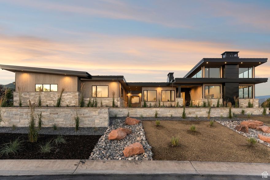 Welcome to 3057 E Corral Peak Circle, a stunning mountain estate nestled within the private gates of Red Ledges, Utah's premier luxury community. Thoughtfully designed with 6,549 sq. ft of refined living space, this home is the perfect balance of high-end comfort, family connection, and four-season adventure.   For buyers seeking a second home or permanent escape from the bustle, this is mountain living at its most effortless. Just minutes from the new East Village at Deer Valley (opening 2025), you'll enjoy seamless access to world-class skiing, dining, and aprs-ski. In the warmer months, Red Ledges transforms into a resort-style haven, with a Jack Nicklaus Signature Golf Course, brand-new wellness center, pickleball and tennis courts, equestrian center, pools, and miles of hiking and biking trails...all at your fingertips.  Inside, four spacious en-suite bedrooms and six bathrooms offer luxurious privacy for family and guests. Gather around the soaring, wood-burning fireplace in the vaulted great room, take in the Timpanogos views beside dual outdoor fire pits, or catch a movie in the 4K home theater with its own wet bar and pellet ice machine.  The chef's kitchen and full butler's pantry are made for entertaining, while smart home features like Control4 lighting, automated shades, and Sonos audio keep everything intuitive. Radiant bathroom floors, multi-zone HVAC, and three laundry stations ensure year-round comfort and ease.  Every detail, down to the heated driveway, pressure-washed 4-car garage, and cold plunge/sauna/wellness suite-has been curated for convenience, joy, and connection.  Whether you're hosting the holidays, skiing with the kids, or escaping for a quiet weekend in the mountains, this home delivers an elevated lifestyle, wrapped in nature, community, and the best of Utah.