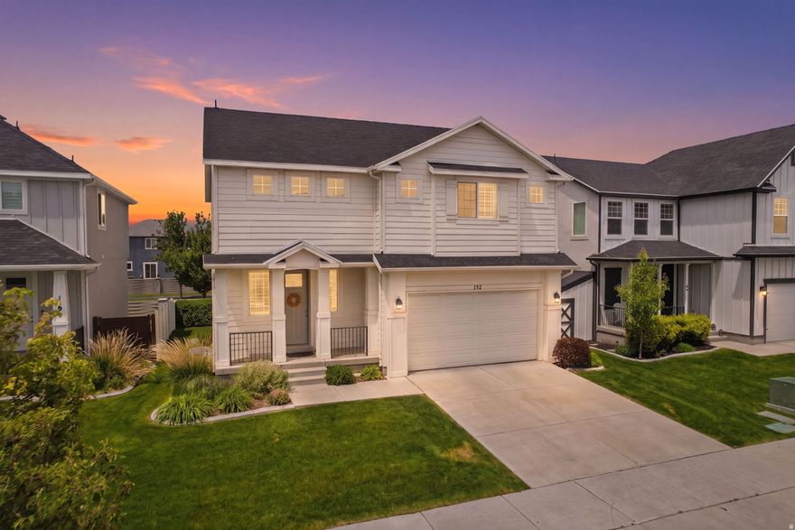 Welcome to this beautifully maintained Vineyard home located in the highly sought-after Waters Edge community! This home has 4 spacious bedrooms, 2.5 bathrooms, and over 3,000 square feet of thoughtfully designed living space, this home offers the perfect blend of comfort, style, and convenience. This home includes a loft area that could easily be converted into a 5th bedroom.  The open-concept main floor is filled with natural light and showcases a modern kitchen with ample cabinetry, generous counter space, and seamless flow into the dining and living areas. This is ideal for entertaining or everyday living. Upstairs, the spacious primary suite includes a private ensuite bathroom and large walk-in closet, while additional bedrooms provide flexibility for family, guests, office space, or hobbies.  Enjoy a fully fenced yard with room to relax, play, or entertain outdoors. Located just minutes from Utah Lake, walking trails, parks, shopping, dining, and quick freeway access. This home also offers access to incredible community amenities.  This is a move-in ready home that is ideally situated in one of Utah County's fastest-growing communities, this is one you won't want to miss!  Buyer may receive a 1/0 buydown lowering the interest rate by one percent for one year by using our preferred lender Matt Barrett at Intercap Lending. If a 1/0 buydown is not available for the specific program the buyer chooses then an equivalent lender credit may be provided.