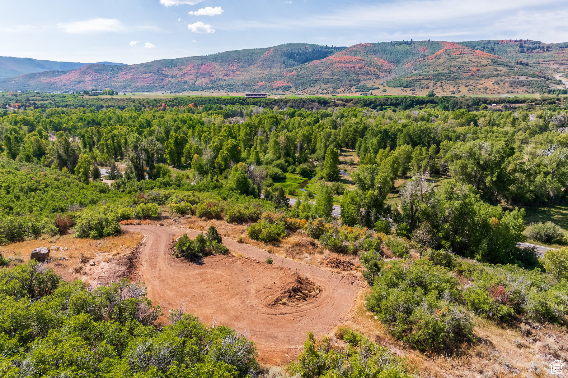 This incredibly rare 40-acre building lot in Woodland offers unmatched privacy, seclusion, and panoramic mountain views in every direction. Located just over a mile south of the red church on State Road 35, the property features a private driveway that winds up to a prime building site. This is a legal lot of record with Summit County and we are including a well permit with the purchase. Enjoy your own private canyon to hike and explore, plus the property is adjacent to Forest Service lands. The opportunities for outdoor adventure are endless! The property is not in an HOA and there are no CC&Rs. It is the perfect place to create your dream mountain retreat while enjoying the beauty and tranquility of the surrounding landscape.