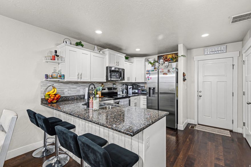 Welcome to this well-maintained and move-in ready townhome nestled in the heart of Eagle Mountain, one of Utah County's fastest-growing communities. Located at 1848 E American Way #14, this charming residence offers comfort, convenience, and modern living at an exceptional value.   Interior Features  Step inside to an inviting open-concept main level featuring:  Spacious living area with abundant natural light  Modern kitchen with ample cabinetry & counter space  Dedicated dining area perfect for gatherings  Convenient main-level half bath  Upstairs, you'll find:  Generous primary suite with private bath & walk-in closet  Two additional bedrooms  Full bathroom  Laundry area for added convenience   Schedule your private showing today! Don't miss your chance to own a beautiful home in Eagle Mountain.