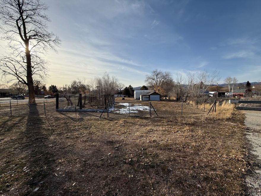 Build your dream home on this beautiful .37-acre corner lot with stunning mountain views and flat, usable terrain. Located in a peaceful small-town setting, this property offers the perfect blend of open space and convenience. Water, sewer, and power are available at the road, making it easy to start planning your build. The property also includes .37 shares of Manti Irrigation water, adding valuable flexibility for landscaping or future use. Enjoy quiet living, wide-open skies, and room to create the lifestyle you've been dreaming of-all while staying close to local amenities. A great opportunity to own land in a scenic and welcoming community. Address is an estimate as it has not been given a permanent address. Square footage figures are provided as a courtesy estimate only and were obtained from Sanpete county recorders office .  Buyer is advised to obtain an independent measurement.