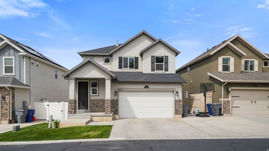 Perched in a premier North Salt Lake location, this exceptional residence offers a lifestyle defined by breathtaking panoramic views of Davis County and sophisticated modern comfort. Built in 2016, the home is designed to maximize its vantage point with expansive windows that invite a wealth of natural light to sweep through the vaulted interiors. The main level immediately impresses with an open-concept layout that flows from the inviting living spaces into a gourmet kitchen anchored by elegant granite countertops, while a private balcony provides the perfect perch for evening relaxation against the backdrop of the valley's shifting colors. The primary suite serves as a true sanctuary, featuring a generous walk-in closet and a layout that prioritizes tranquility. Providing a unique opportunity for customization and expansion, the unfinished basement offers significant room to grow and features elegant French doors that lead directly to the backyard and patio. Beyond the home's distinctive design, the location provides an unmatched balance of suburban serenity and urban accessibility, situated within walking distance of Hatch Park and local favorites, all while maintaining effortless freeway access for a minutes-long commute to downtown Salt Lake City. This home represents a rare opportunity to secure a modern retreat that combines architectural volume, high-end finishes, and some of the most compelling views in the region.