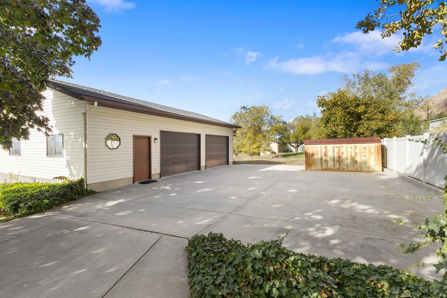 Breathtaking Views in Every Direction! Experience the perfect blend of peace, space, and modern comfort in this beautifull 3-bedroom, 2-bath home nestled in the foothills with panoramic views of Willard Bay, Ben Lomond Peak, and magical sunsets that will take your breath away. Sitting on over a half-acre lot, this property offers a sense of privacy and seclusion-your own slice of paradise. The home has been tastefully updated with new LVP flooring, granite countertops, and all-new vanities, giving it a fresh, modern feel. The spacious basement features a large bedroom, an oversized family room, and a bathroom with a walk-in shower-perfect for guests or a private retreat. Car enthusiasts and hobbyists will love the detached 40 X 25 feet garage, complete with heating, a workbench, and plenty of space for vehicles, tools, or toys. There's ample room for parking all your trucks, trailers, and recreational gear.   Located just minutes from Willard Bay State Park, you'll enjoy easy access to fishing, boating, hiking, and biking-all from your own backyard. This home truly offers the best of Utah living-space, views, and serenity. Don't miss your chance to own this hidden gem!  Information provided as a courtesy only, buyers and buyers agent to verify all. Square footage figures are provided as a courtesy estimate only and were obtained from County records. Buyer is advised to obtain an independent measurement.