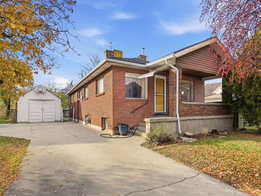 Multiple offers received, highest and best by 5pm Monday November 24th! Endless Potential in the Heart of Provo! Discover a rare opportunity with this spacious 2,600+ sqft rambler, offering incredible flexibility for two separate living spaces-ideal for investors, house hackers, or anyone looking to build serious sweat equity. This home has been loved by the same family for decades and is ready to be reimagined and brought out of the 80's. Located in a prime Provo location, you're just minutes from BYU, Provo City Center, FrontRunner, Provo Rec Center, and the vibrant downtown dining scene. Students, young professionals, and long-term renters all love this area-making this property a standout investment opportunity with strong rental demand. The home features a solid layout with an 80's addition that expanded both the main floor and basement, giving you even more value to work with. The roof was replaced just three years ago, and the back deck with its charming awning is the perfect place to enjoy summer evenings. Outside, the property includes a one-car garage currently used as a workshop/storage space. With some updates, vision, and TLC, this property has the potential to become a high-performing rental, duplex-style setup, or a beautifully refreshed home with built-in equity. Opportunities like this-in this location-don't come around often. Come see the possibility for yourself!