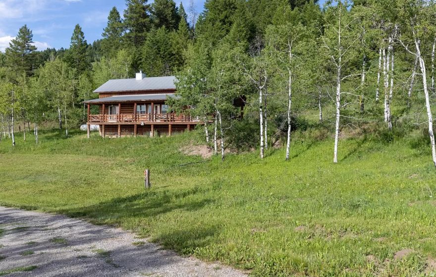 Secluded Mountain Cabin in Star Valley Wyoming Your private wooded retreat awaits! This charming 2-bedroom, 2-bathroom cabin sits on secluded acreage surrounded by mature trees in beautiful Star Valley. The spacious great room provides perfect gathering space, while the large covered deck offers stunning mountain views and outdoor living at its finest. Enjoy morning coffee or evening relaxation surrounded by nature's beauty. Tucked away among the trees with natural privacy, you'll experience true mountain tranquility yet remain close to Star Valley amenities and world-class outdoor recreation. The basement provides valuable storage for gear and toys, and the wooded lot offers excellent potential to add a shop building for vehicles and equipment or expand the living space. Perfect for full-time living, weekend getaways, or investment. This Star Valley gem delivers the ideal Wyoming mountain lifestyle with room to grow!