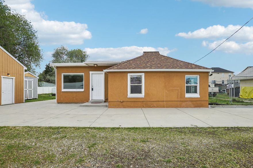 Sharp, clean, and move-in ready. This 2-bedroom, 1-bath single-family home delivers solid value with upgraded finishes throughout and a layout that makes sense. The kitchen comes equipped with stainless steel appliances and a modern feel that carries into the rest of the home. Out back, you'll find a large yard with room to expand, entertain, or put it to work. The standout feature is the oversized detached garage-perfect for storage, projects, or extra parking. A straightforward, well-kept property with the right upgrades in all the right places. Schedule your showing today!