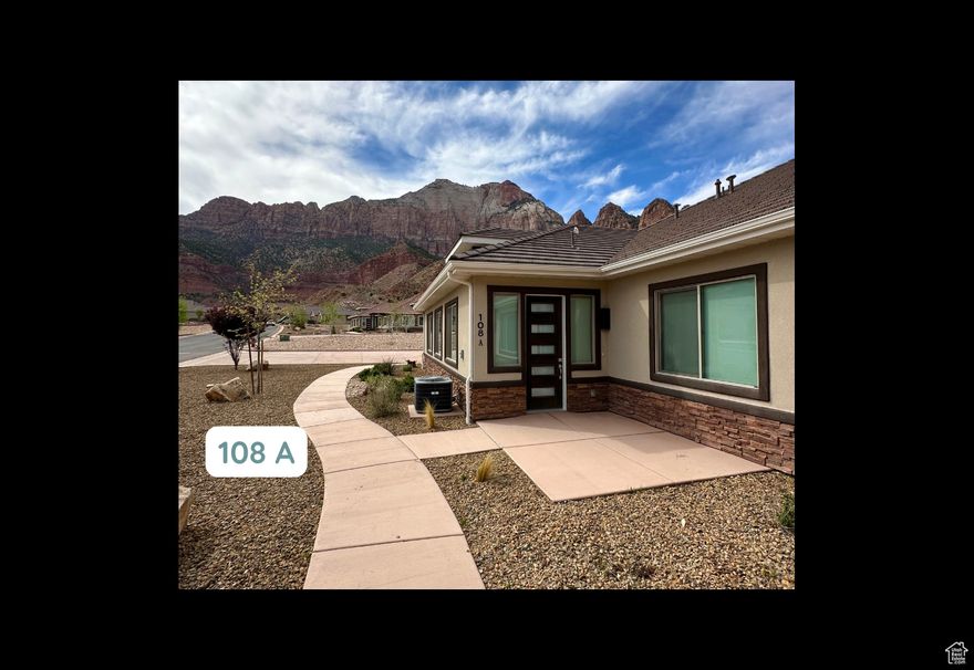 Your Zion Retreat awaits!! Extremely rare opportunity to own, one, two, three or four beautiful, like new condominiums just 1/2 mile from Zion National Park! This is a four plex property. Ideally, the Seller would like to sell all 4 together, but is willing to sell individually as well. All four units are the identical layout, with the same features and finishes.  Located in the tranquil Moenave community, in the heart of Springdale, Utah, this home offers stunning, unobstructed 360 degree towering red rock views. With expansive windows and 9' ceilings natural light fills the home, ensuring you're surrounded by breathtaking scenery from every room.  The thoughtfully designed floor plan provides an inviting and spacious living area. The kitchen features a large island, granite countertops, subway tile backsplash, and custom cabinetry with crown molding, glass accents, with above and under-cabinet lighting. Stainless steel appliances, including a gas (propane) range and side-by-side refrigerator with water and ice dispenser, complete the space. Luxury vinyl flooring flows throughout the main living areas, complemented by recessed lighting. Bathrooms feature tile flooring, tile shower surrounds with glass doors, and granite countertops, adding to the home's refined design.  The covered patio off the dining area creates a charming outdoor living space perfect for enjoying your morning coffee and evening cocktails. You simply can not beat the peaceful beauty that is Moenave.  Built with high-quality, energy-efficient features, including 2x6 exterior walls, blown-in insulation (R50 attic / R23-25 walls), Low-E windows, a 95+% efficient furnace, and a tankless water heater, this home offers both comfort and sustainability. Located at the heart of Springdale, and in walking distance from its shops and restaurants with an abundance of stunning hiking and biking option, this home is the perfect blend of luxury, convenience, and breathtaking, natural beauty. Everything you dreamed your Zion Retreat would be, and more!  ALL furnishings & Appliances INCLUDED! Excellent investment opportunity! The current owners have used one for their family to stay when they visit and have kept the other three rented to excellent tenants for the last couple of years.  PHOTO NOTE - There are two interior color palettes. The first features Dark Walnut cabinetry with brown toned granite and tan and white tile work in the bathrooms. Unit C is the only one with this palette and most of the photos are taken of that Unit, due to vacancy at time of listing, and it allows us to show the full layout of the home, as all Units are the same layout and include almost identical finishes. Units A, B & D all feature White cabinetry with grey toned granite and grey and white tile in the bathrooms. There are a few photos included showing this palette, as well as this Units front entry and back patio. The City of Springdale does not allow overnight rentals. Long term rentals are allowed at a minimum of 60 days.  All information provided as a courtesy. Buyer to verify all.