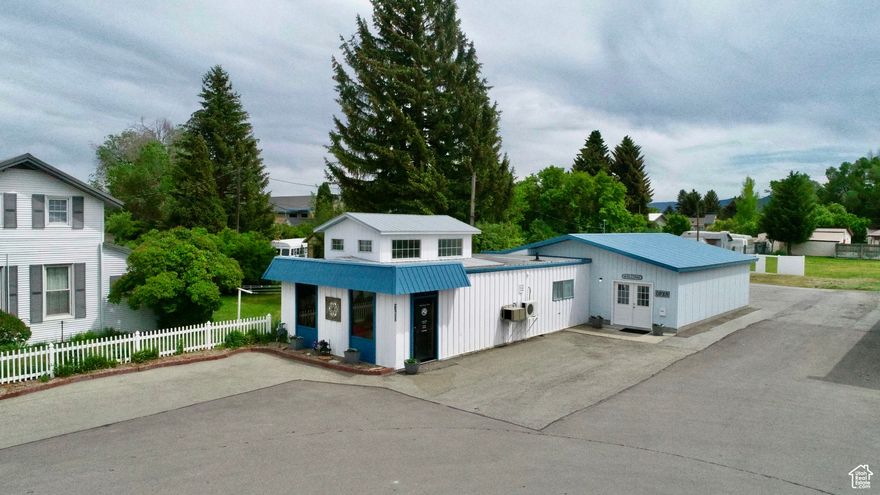 HUGE PRICE DROP!! Here Is Your Chance to Buy This Sought-After Commercial Building In the Heart of Soda Springs with An IDEAL Location on the Main Highway Going Through Town! Capture the Attention of Locals and Tourists Alike with So Many Available Uses Under the C2 Building Code. Would be GREAT for Retail, a Restaurant, Office Space for Your Own Business with Space to Lease Out to Other Companies, or Choose to  Also Purchase the Historic "Soda Springs Floral" Flower Shop that has Operated from this Building for Decades and Continue It's Legacy in Our Area! You're Sure to Enjoy the Stylish Entrance and Front Lobby with the Pitched Roofline and Windows with Stained Glass that Add Both Country Charm and Ample Lighting to Liven the Space Up! Behind the Spacious Front Lobby You'll Find Lots of Open Space with Vaulted Ceilings Ready to Fill With Your Industry Supplies and Business Vision! So Many Possibilities! Enjoy the New Back-Area Addition Which was Built in 2016, Updated Plumbing, Wiring and Electrical Panel in 2016, New Copper Piping in the Sewer Line Added in 2017, New Furnace Installed in 2022, Bathroom Updated in 2023, and New Water Heater Installed and Asphalt Resurfaced in 2024. Also Included are 2 Industrial Sized Coolers & A Large Work Table. This Durable Steel Structure with 2 Separate Entrances is Sure to Be a Great Investment. Parking Is Available Behind the Building and in Front of the Building. This Is The Year to Bring Your Business Vision to Life! Asking Price is for Real Estate Only. Call Listing Agent to Schedule Your Private Showing Today!