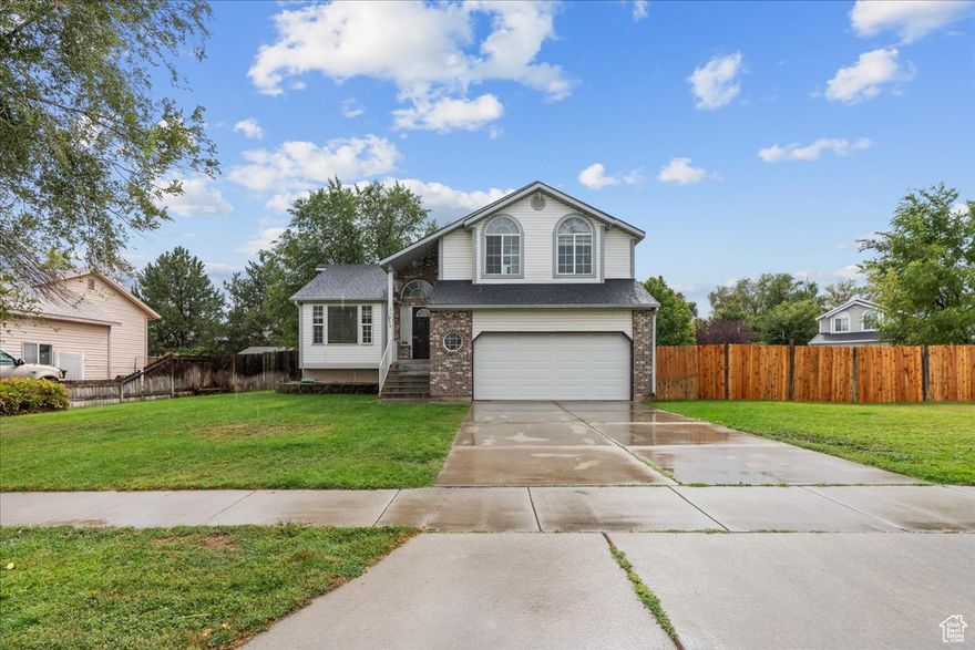 Welcome to this 4-bedroom, 3-bathroom home on a spacious corner lot with room to add RV parking. Featuring brand-new carpet in the main living room, a brand-new roof, and all appliances included. Designed with entertaining in mind, the basement offers a dry bar, couch, and TV for the ultimate hangout space. With plenty of room inside and out, this home blends comfort, convenience, and fun-ready for you to make it your own.  Square footage figures are provided as a courtesy estimate only and were obtained from county records.  Buyer is advised to obtain an independent measurement.