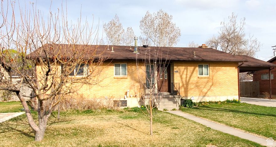 Look no further!  Large great rooms upstairs and down with cozy fireplaces.  Tons of storage including attic access with plywood flooring.  Laundry chute. Built-in safe for your valuables. Enjoy the beautiful custom built-in cabinets, shelves and finishes in the basement. Lower utility bills because this place has fully-owned solar panels! Separate basement entrance. Large yard with garden beds, woodpile, dog or chicken run, swing, trampoline & shed. Grapes &  raspberries. Fruit trees: apple, pear, peach, cherry, plum!