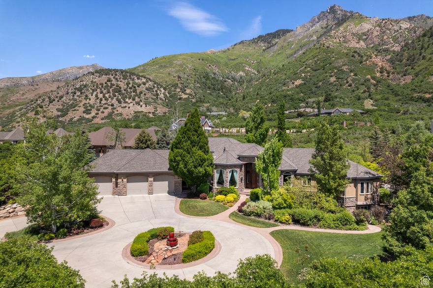 Luxury is here--within quick driving distance to all ski resorts, and next to mountain biking trails. Can be a short term rental, too. Plus, there's a full work-from-home office on the upper level.  It's more a lodge than a home--Designed by Utah's best architect just for a mountain getaway and...Gatherings....with soaring Ten to Eighteen foot ceilings on main floor; ten in the basement adding to the space to relax and mingle. It is comfortable for just the two of you, or expand the group to a hundred--"The Heritage" can handle it! Giant kitchen island, enormous walk in pantry, 6 burner stove, New double ovens, warming drawer, 2 dishwashers...a professional grill just outside the back door, and it's all built to make your family and guests welcome, whether hosting an intimate gathering, or entertaining everyone and their plus one (or two or three). Master suite is big enough to make you say, Wow! then--take another breath before you see the size of the huge walk in master closet, and ensuite. Master shower is private a steam room for those winter days you want the chill to just go away--Step out to a private hot tub outside the master suite door-(room to upgrade to a covered year-round swim spa if you prefer), and provides privacy to soak away while the winter snow falls around you, or in summer you listen to the fountain and breathe fresh mountain air.  All other rooms have walk in closets with built in organizers, so everyone else feels as pampered as you do. New, updated lighting throughout the home. Two kitchens, (Three dishwashers -2 are new), new double ovens in 2024.  All rooms are beyond spacious, not just the master suite--and it's oversize indeed. The valley at night is breathtaking, and the mountain view year round is unobstructed and soul gratifying.  360 degree views from all windows encompassing a full mountain in the back, valley in front, and sky everywhere. Mountain views even from basement windows. Heat is radiant in the floor so your feet are never cold, even while you snuggle next to the fireplace and watch through the oversize windows. The boilers are top of the line, and  give the most efficient, silent, dust-free heat--they'll outlast the house. There's an extra boiler if you want to put heat in the driveway.  HVAC system recently tuned up, working great. Smart Home features for Alexa, Google, and phone app: Outside lighting, Interior lighting, Sprinkler System. Music system throughout. Theater room has Dolby sound for those "let's just hang out here days". Home backs to 30 feet of open space, and nothing more can be built behind, or in front. Yard is private and boasts Mature Maples, Pines, and Scrub Oak, and when the Aspens whisper in the breeze it's so quiet here, you'll hear them. Wildlife peeks in and out of their hidey places on the mountain, just to see if you're still around. Note the 5 garages--two on street level, and 3 more above with plenty of space to park, and 8' doors. It has a full laundry, kitchen. Power for EVs is there, too!  The upper floor has fresh mountain views from the newly re-constructed deck.. Originally designed as office space for 3, but we've listed it has having at least 1 bedroom. However, if someone wants to convert it into more bedrooms and a bath, that's easy--It's quite spacious, and could even be a separate apartment area if desired. ADU - The basement apartment has previously been approved by Alpine city, rented out, and can be again. Don't think you have to go to Park City for a lodge-like home..it's right here, nestled in Alpine. Alpine allows short term rentals, and this kind of luxury is very sought after.  Come see!