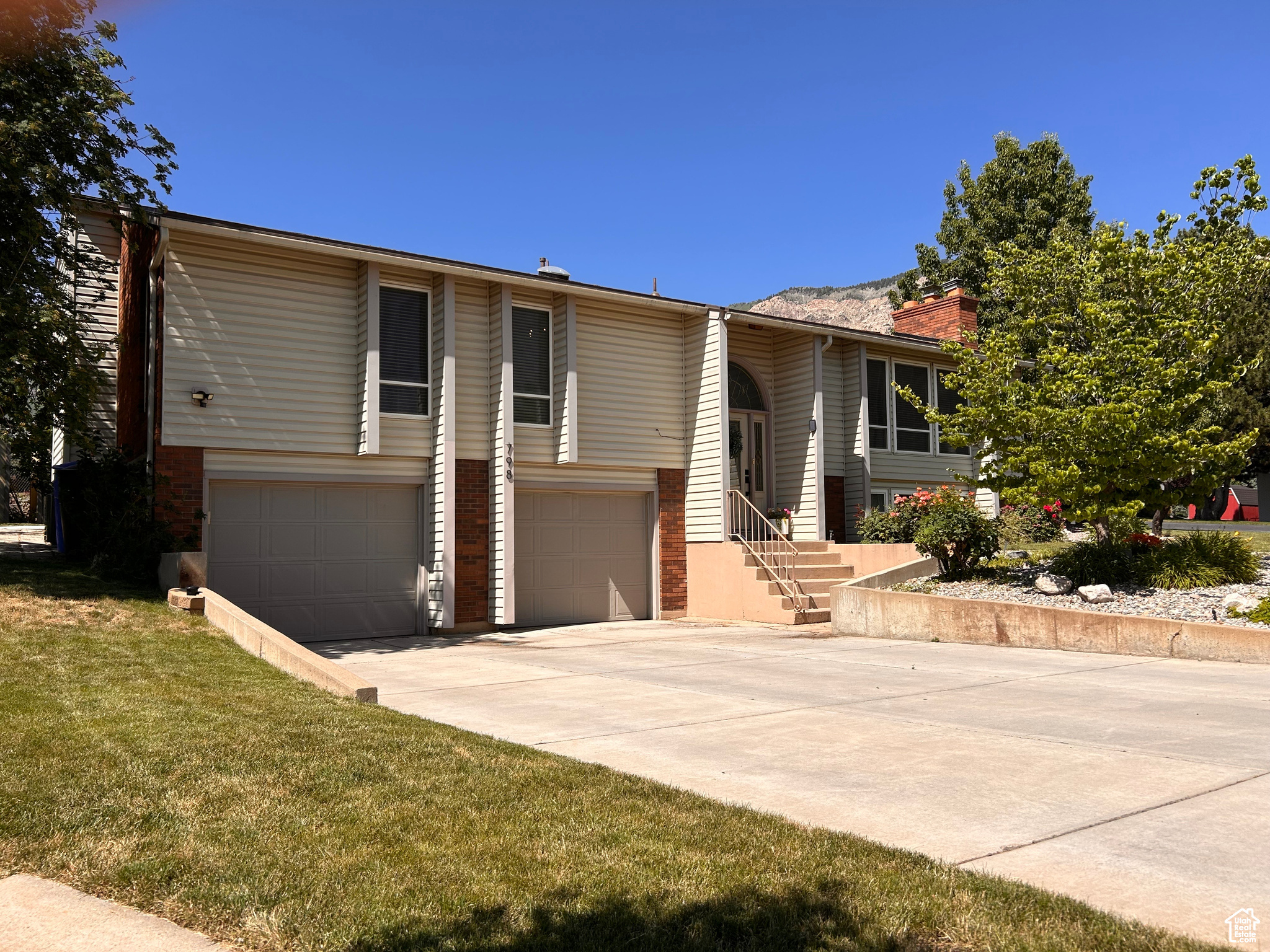 Come see this beautiful home with immaculate new updates in a quiet North Ogden cul-de-sac. Stunning mountain views near North Ogden Divide and Ben Lomond Peak. Close to trails, fish pond, shopping centers, library and mountain ski resorts. This amazing home features four bedrooms, three bathrooms, a formal dining room, two large family living rooms, two gas fireplaces, Shelf Genie Pantry, two car garage with workbench and storage room, two sheds, four raised garden beds containing ever-bearing strawberries and raspberries, a mix of mature and newly planted shade trees, LeafFilter gutter guard, covered deck and new AC installed 2025 and smart thermostat. This home has been meticulously updated in most rooms. Reach out for a private showing today. Owner Agent.