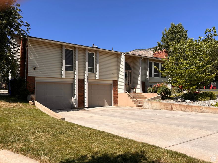 Come see this beautiful home with immaculate new updates in a quiet North Ogden cul-de-sac. Stunning mountain views near North Ogden Divide and Ben Lomond Peak. Close to trails, fish pond, shopping centers, library and mountain ski resorts. This amazing home features four bedrooms, three bathrooms, a formal dining room, two large family living rooms, two gas fireplaces, Shelf Genie Pantry, two car garage with workbench and storage room, two sheds, four raised garden beds containing ever-bearing strawberries and raspberries, a mix of mature and newly planted shade trees, LeafFilter gutter guard, covered deck and new AC installed 2025 and smart thermostat. This home has been meticulously updated in most rooms. Reach out for a private showing today. Owner Agent.