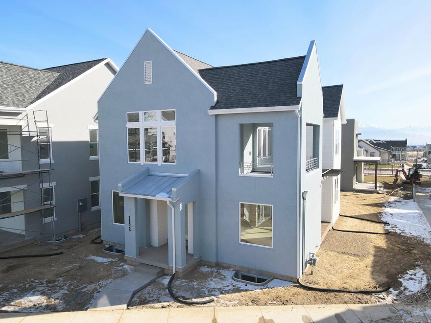 Brand new construction home with a FINISHED BASEMENT and 6ft fenced backyard! Price includes impressive designer upgrades such as: wet bar, 9ft ceilings on all levels, fireplace, railing, incredible use of space with indoor/outdoor living layout with large sliding glass doors next to the Great room and Kitchen. The main level office has plenty of light with all the windows. This home has a dreamy Primary suite with a covered balcony that is hot tub ready and an en-suite bathroom with a stand-alone bathtub and large walk-in shower. Estimated completion: February 2026.