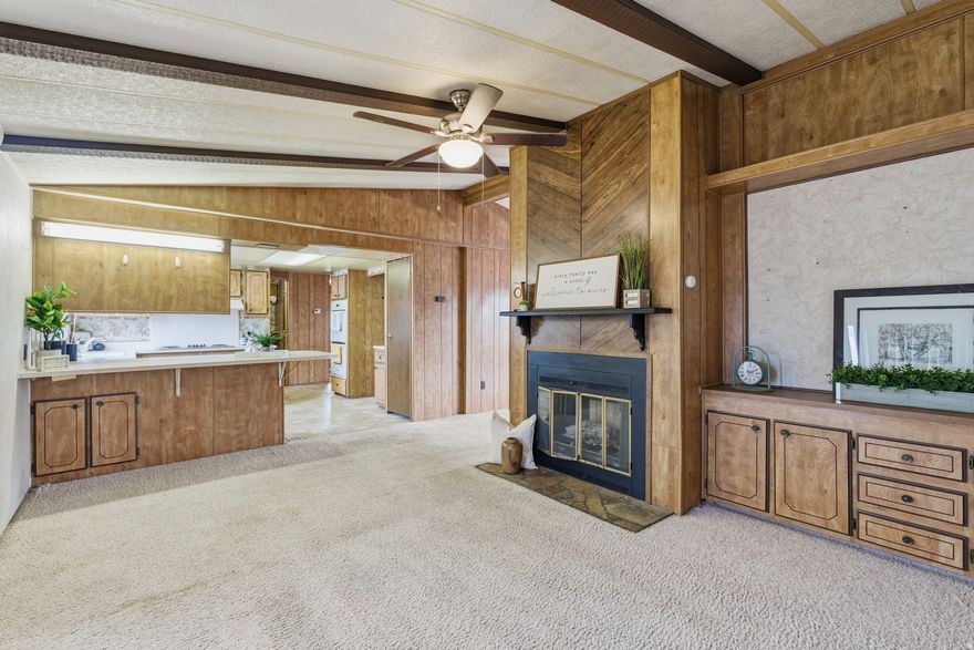 Awesome 3-bedroom, 2-bath home on a sprawling .39-acre lot. This home offers main-level living, so no trudging up and down stairs! The well-laid-out floor plan features both a separate living room and family room, providing plenty of space for entertaining, relaxing, or working from home. The kitchen has tons of cabinet space and even a double oven! The primary bedroom features a large closet and en suite bath. The huge lot offers tons of parking, a detached 2-car garage, and ample room to grow-perfect for additional storage, a shop, or outdoor living space.  The location can't be beat, close to health care facilities, schools and shopping! With its generous lot size and desirable location, this property would be a great fit for an investor or owner-occupant looking for room to grow, so SCHEDULE YOUR SHOWING TODAY!