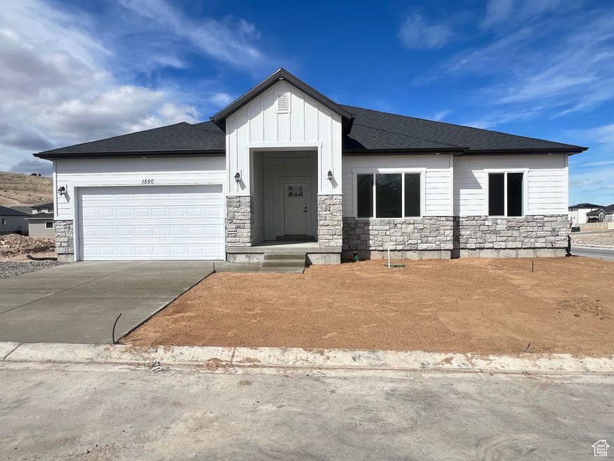 This is our Caldwell floor plan. This home is MOVE IN READY!!! Home features 9 ft ceilings, grand kitchen, large island, walk in pantry, painted custom cabinets, upgraded flooring, stainless steel appliances, large owners suite and walk in closet. Located on .33 acre corner lot with breath taking views of the valley and mountains. Call or text agent for details. Includes $10,000 preferred lender incentive!