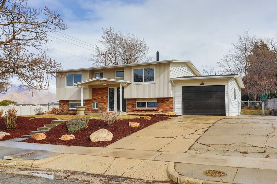 Welcome to this stunningly updated Tooele home. Nestled on a conrner lot of a quiet cul desac.   Step inside to enjoy countless upgrades throughout, including plush NEW carpet, fresh NEW paint, stylish NEW light fixtures, and more. The remodeled kitchen is a showstopper with sleek granite countertops, custom tile backsplash, and brand NEW appliances-with the refrigerator included!  Enjoy the large deck and fenced in backyard these upcoming summer nights.   With ample space to gather, entertain, and relax, this home is truly super clean and completely move-in ready.  Don't miss your opportunity-schedule your private showing today!