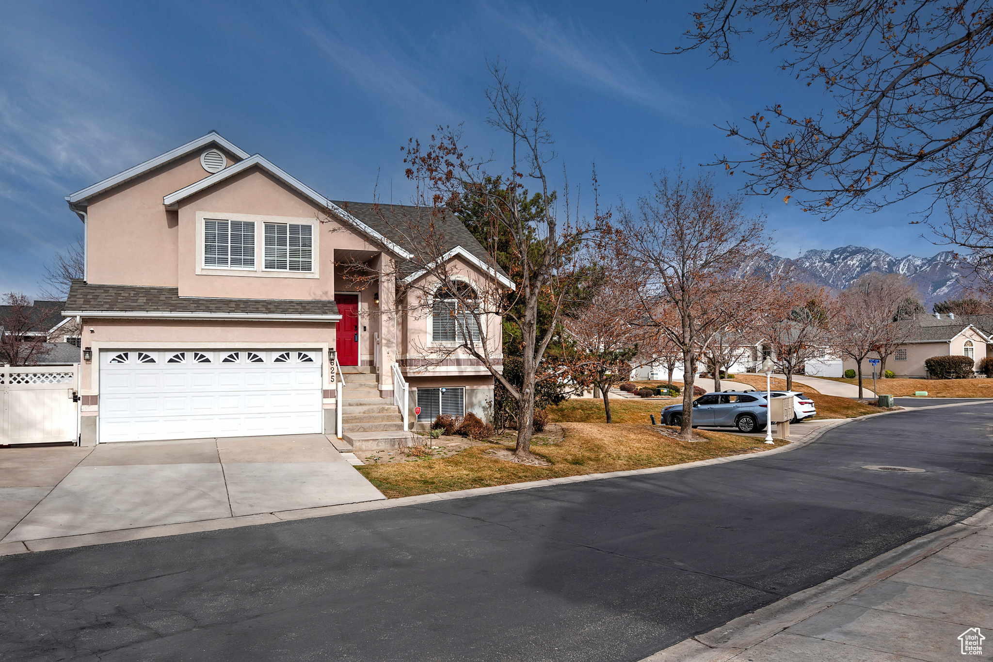 Welcome to your dream home in a sought-after gated community, perfectly situated just minutes from the vibrant shops and restaurants of Fort Union. With Big and Little Cottonwood Canyons only 10 minutes away and downtown Salt Lake City just a 20-minute drive, this location offers the perfect blend of convenience and adventure.  This beautifully updated home has been meticulously maintained and is truly move-in ready. The fresh, modern interior features all-new paint, complemented by sleek quartz countertops that elevate the kitchen and bathrooms. A newer deck, stairs, and floating Trex deck create the perfect backyard for entertaining and relaxation, while new carpet and LVP flooring throughout add warmth and comfort. The living room has been transformed with a stunning new fireplace and custom built-ins, providing a stylish and inviting focal point. The front yard has also been refreshed with newly landscaped flower beds, enhancing the home's curb appeal.  Best of all, this home offers effortless living. The HOA takes care of lawn maintenance and snow removal including the driveway and stairs so you can spend more time enjoying the things you love. Plus, the community pool is perfect for relaxing or hosting friends and family.  Don't miss this incredible opportunity. Schedule your showing today!