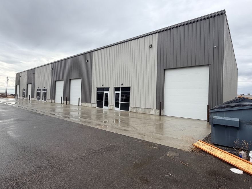 Smithfield UT New Warehouse Spaces. Just off Hwy 91, multiple bays available or the entire 11,100 SF. Ample parking. Tenant improvements negotiated. High visibility, easy access location.