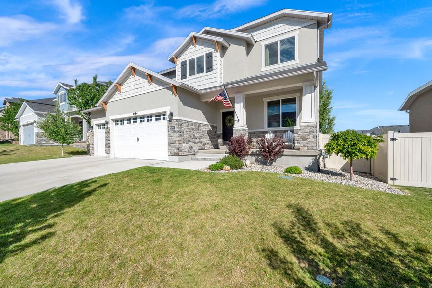 Absolutely gorgeous home in a HIGHLY DESIRABLE Herriman location. This move-in ready home sits on a spacious lot and features full fencing, full landscaping, and a  3-car garage. The current owners have taken very good care of this home and added some nice upgrades, some that include new a/c 2025, new furnace 2026, out door lighting, decorative walls, butler bar, & more.  Beautiful mountain views and conveniently located near shopping, dining, schools, and easy access to Mountain View Corridor. Square footage is from a recent appraisal, buyer and buyers agent to verify all information.