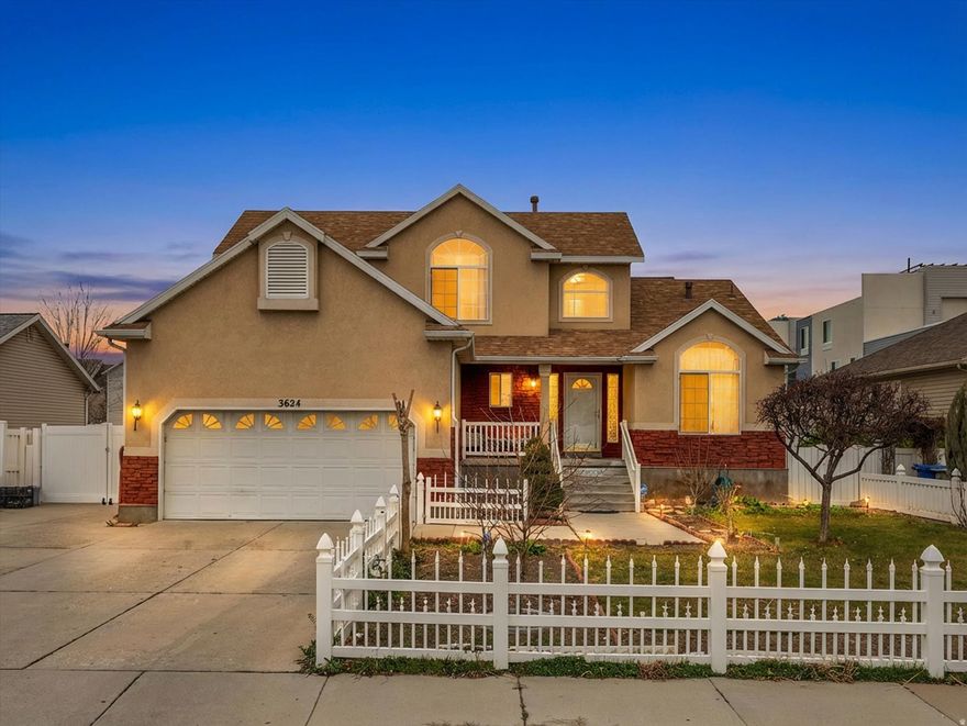 Welcome to this meticulously maintained Ivory home, ideally situated in a highly desirable neighborhood. This impressive West Valley residence offers over 3,300 square feet of thoughtfully designed living space, exceptional curb appeal, and a functional floor plan that truly delivers. The home features 6 spacious bedrooms, 3.5 bathrooms, and a fully finished basement with a separate entrance, providing outstanding flexibility for multi-generational living or potential rental income, with additional room to expand if desired. The main level showcases soaring ceilings in the family room, a vaulted kitchen, and a main-level primary suite for added convenience. The basement includes two bedrooms, along with kitchen and laundry rough-ins, making it ideal for a private living suite. Nestled on a .15-acre lot, the property boasts mature landscaping, a fully fenced backyard, and a private patio-perfect for relaxing or entertaining. Bright, well-maintained interiors create inviting spaces for both everyday living and gatherings. Additional highlights include a newer roof, numerous inclusions, extra-long RV parking, no HOA! Conveniently located near parks, schools, shopping, and major commuter routes, this home offers exceptional value and versatility. Priced to sell, this turn-key property blends comfort, style, and opportunity. Schedule your private tour today-homes of this caliber are rarely available. All information herein is deemed reliable but is not guaranteed.